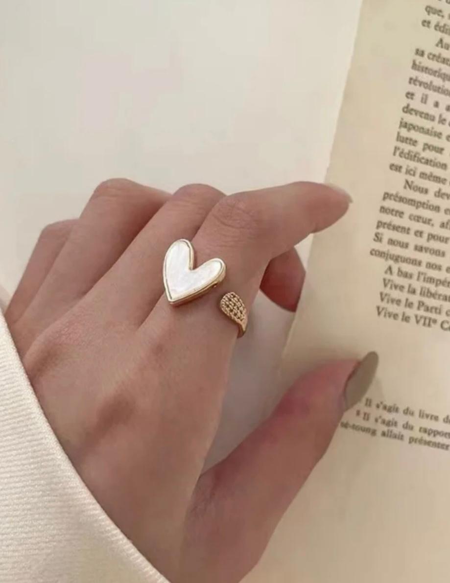 White heart-themed golden ring